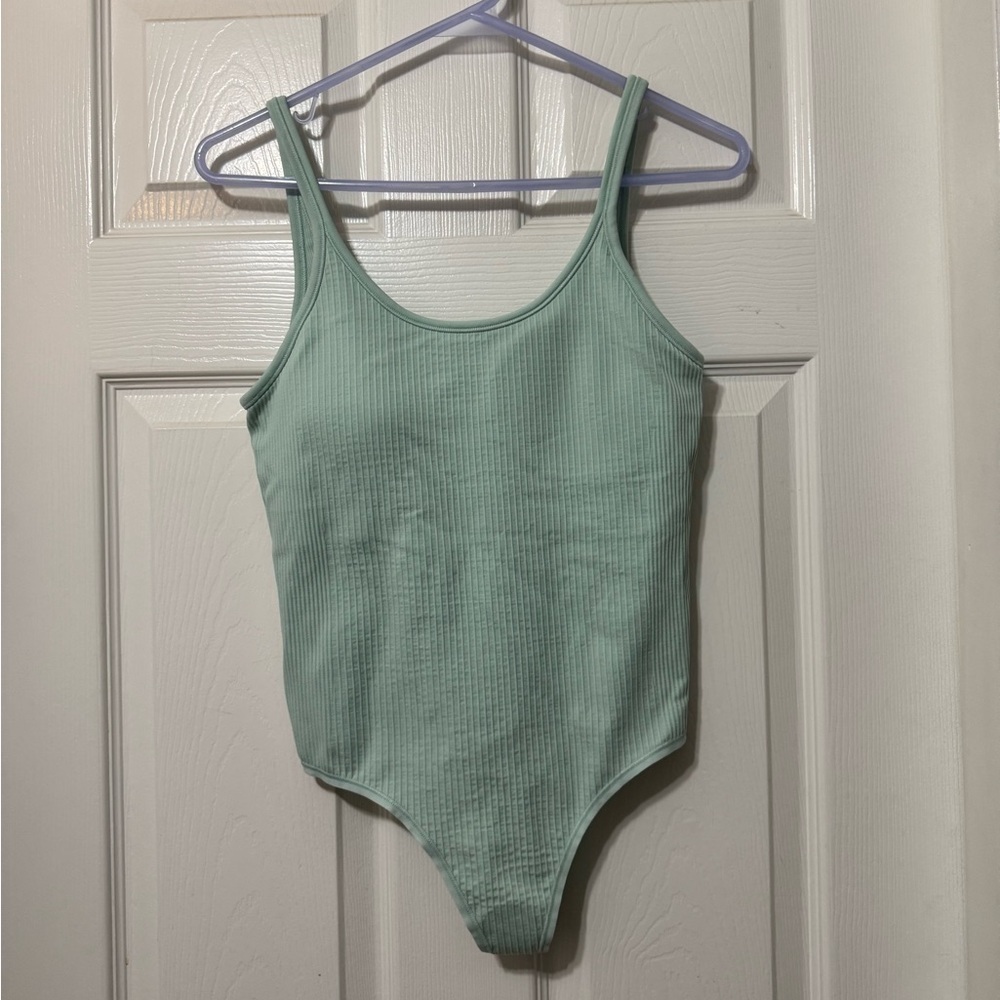 Lululemon ebb to street body suit size 6 nwt